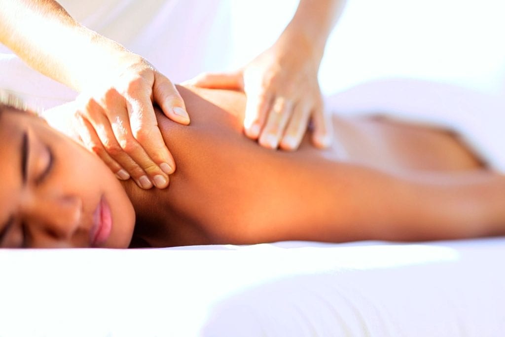 A girl taking massage at massage parlor