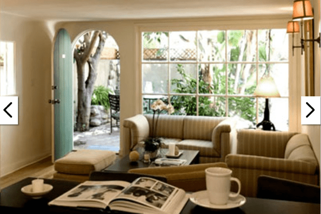 Interior of a house with a big window and a door