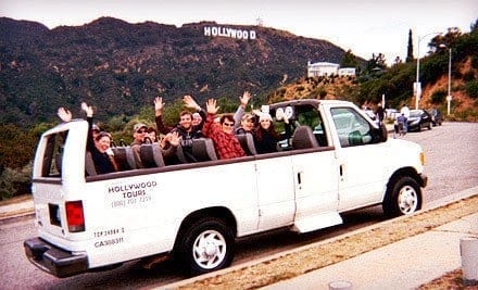 Group of people riding a big size car