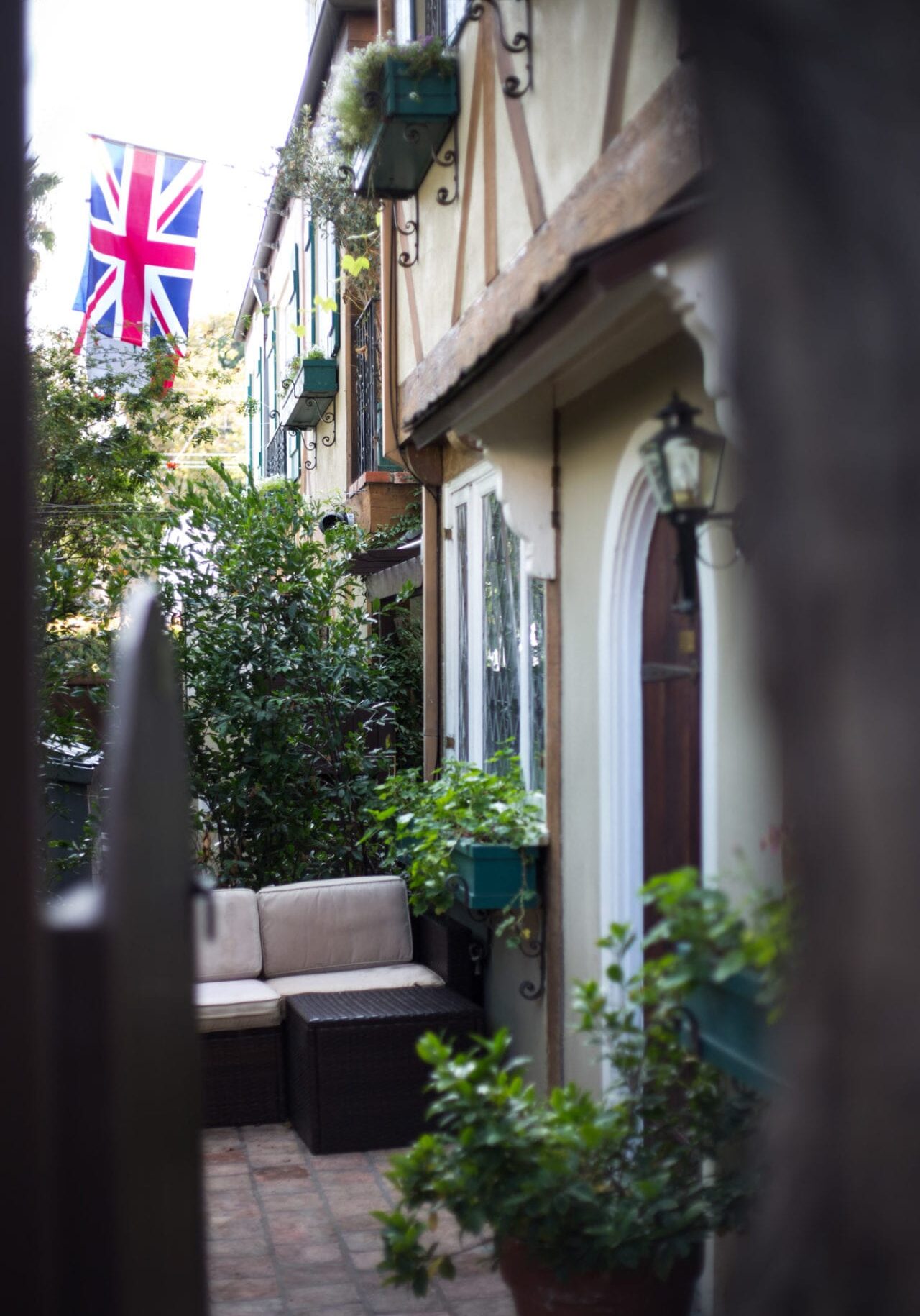 A British flag is flying over The Charlie Hotel.